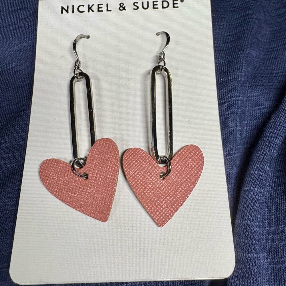 Nickel + Suede Mila earrings: leather Terracotta hearts with silver tone.